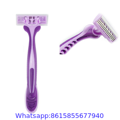 Triple stainless steel blade razor with lubricating strip